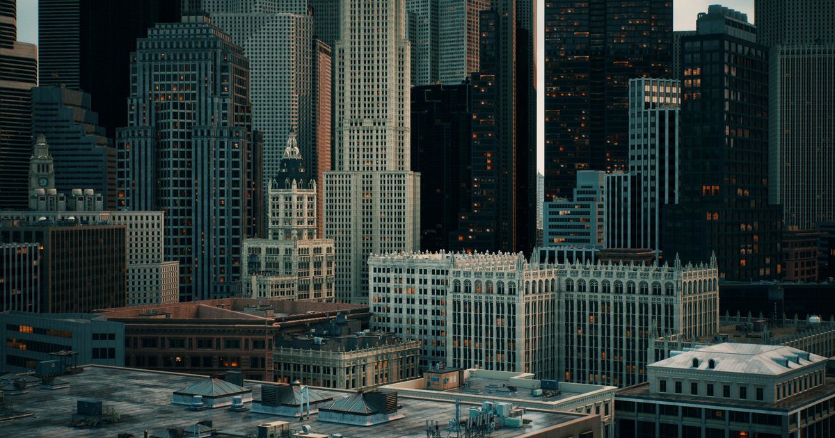 Dense downtown skyline of office towers, the kind of financial district where large hedge funds keep their headquarters